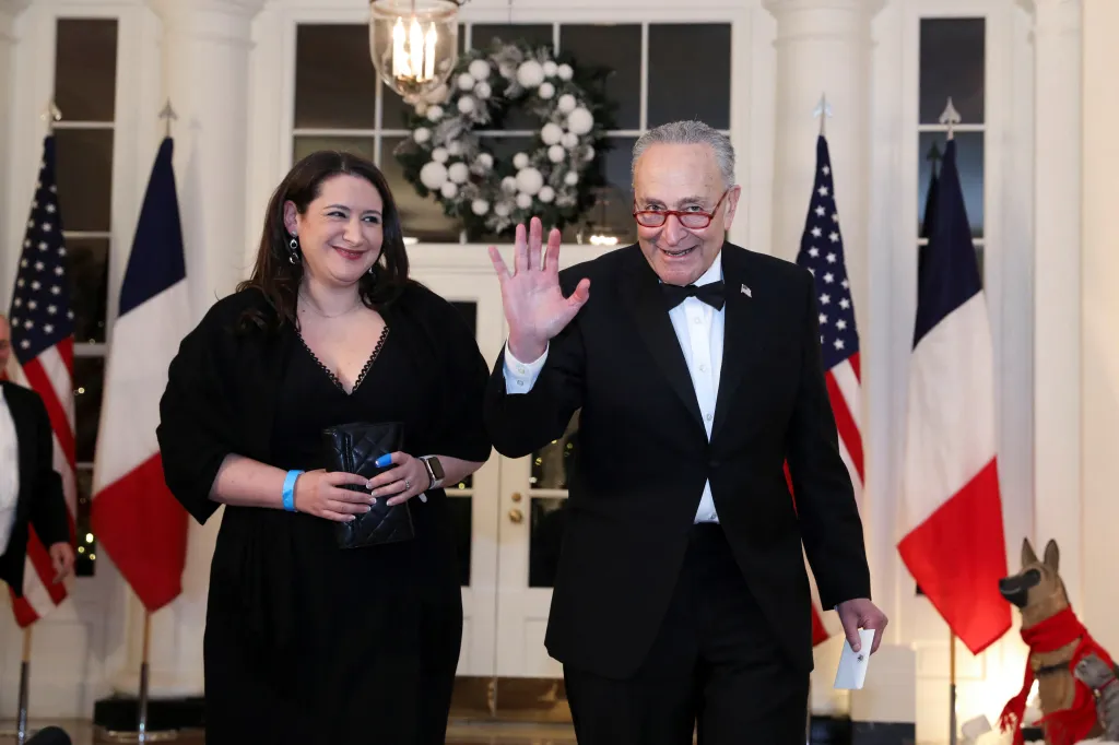 Then-Senate Majority Leader Chuck Schumer and his daughter Jessica Schumer arrive for a state dinner in honor of French President Emmanuel Macron at the White House in Washington on Thursday, Dec. 1, 2022. Jessica Schumer was recently hired by OpenAI.