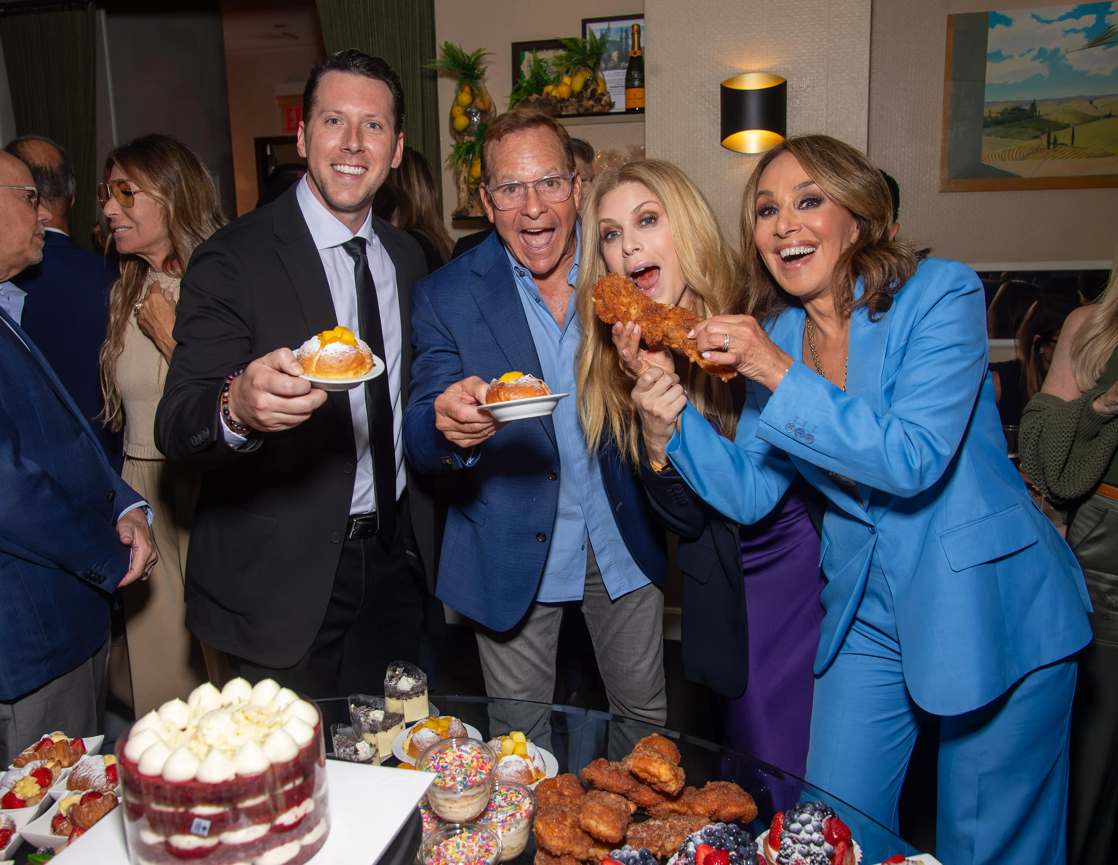 Ryan Kristafer, Steve Guttenberg, Jill Martin, and Rosanna Scotto enjoy dishes from Fresco by Scotto.