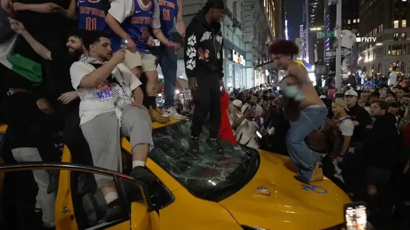 Vargas, joined other rowdy fans on the car for the celebration — including a man wearing a keffiyeh and another holding a Palestinian flag, perched atop the destroyed cab.