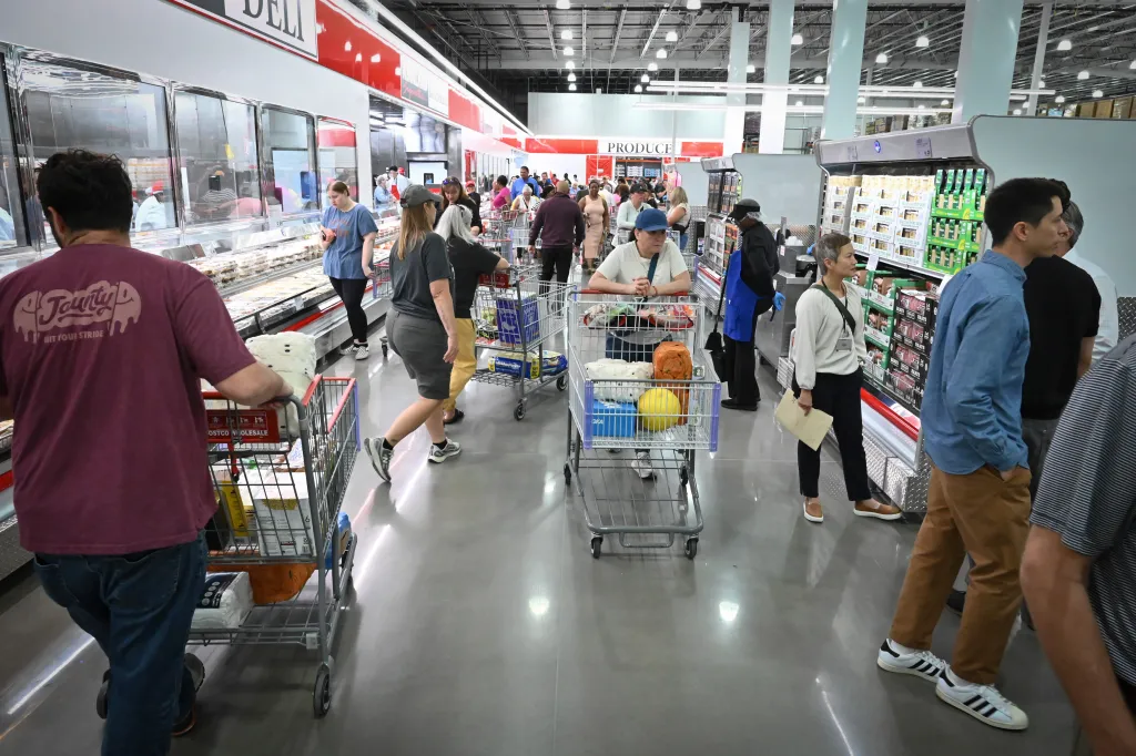 Shoppers explore the aisles of a newly opened Costco.