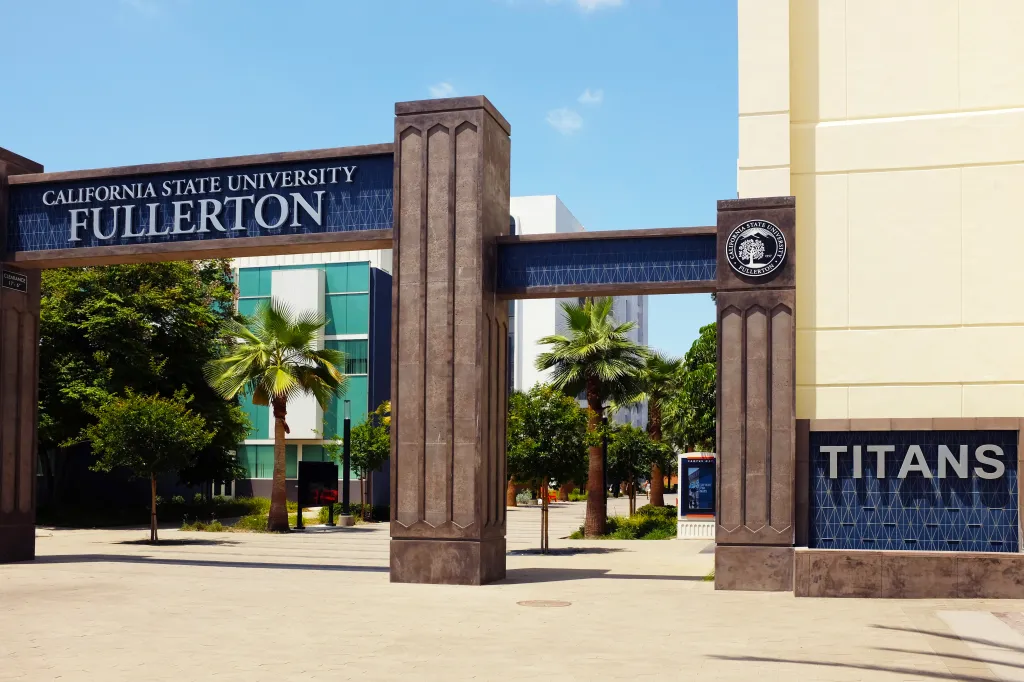 Archway entrance to California State University Fullerton's Langsdorf Hall, with 
