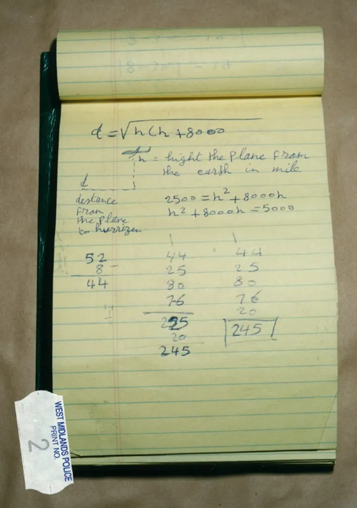A sketch in a notebook shows a drawing of a plane and mathematical calculations.