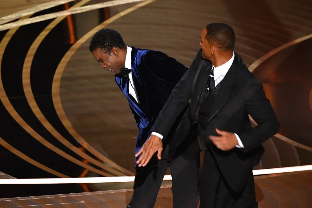 Will Smith slapping Chris Rock on stage at the 94th Academy Awards.