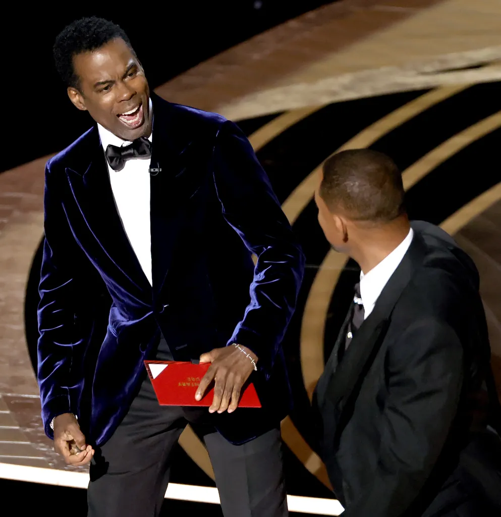 Chris Rock appearing to react to Will Smith slapping him at the 94th Annual Academy Awards.