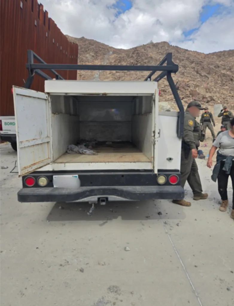 Modified utility truck used by smugglers to pack 31 illegal immigrants near Ocotillo, California.