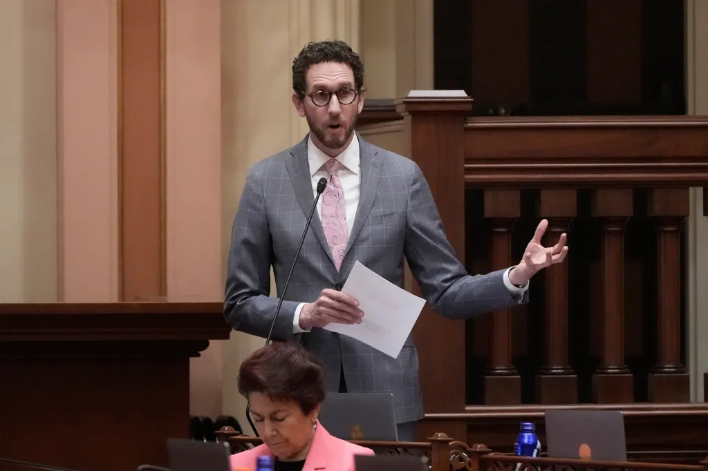State Sen. Scott Wiener speaking in the Senate Chambers.