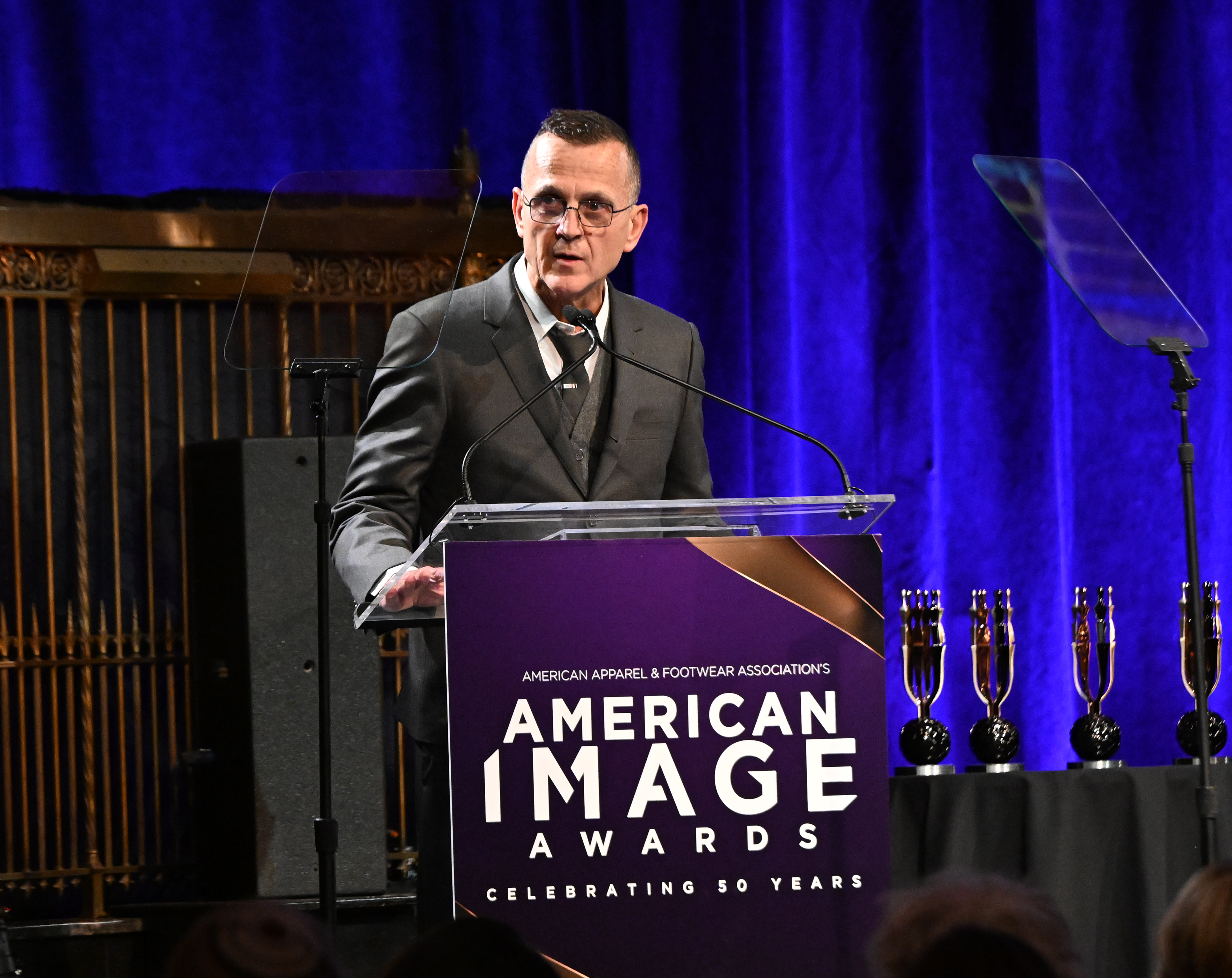 Steven Kolb speaking onstage during the AAFA American Image Awards.