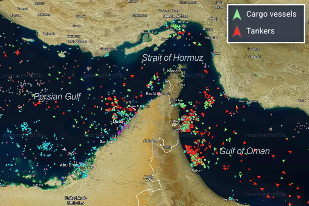 Illustration of the Strait of Hormuz showing cargo vessels and tankers.