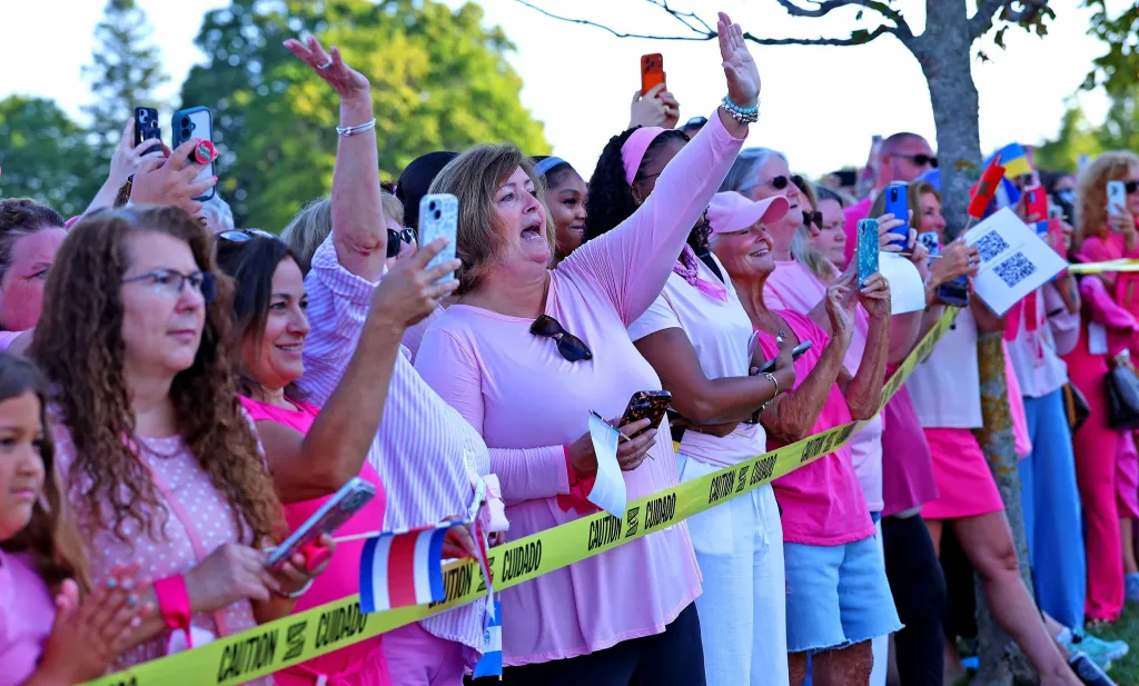 Supporters of Lindsay Clancy wear pink and yell words of encouragement to her lawyer, Kevin Reddington, as he arrives at Plymouth Superior Court on Thursday, Aug. 20, 2026