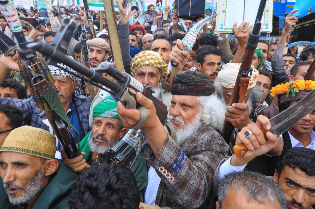Houthi rebels holding rifles and daggers during a rally in Sanaa, Yemen.