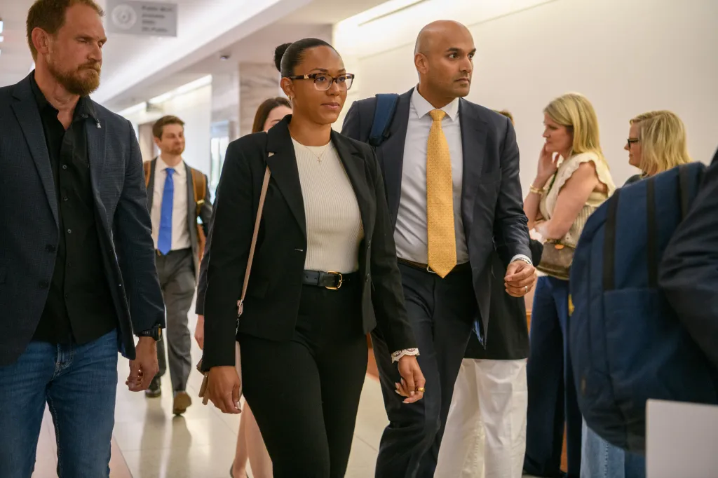 Surrogate mother McKenna West arrives at the Dallas County Courthouse with her attorneys.