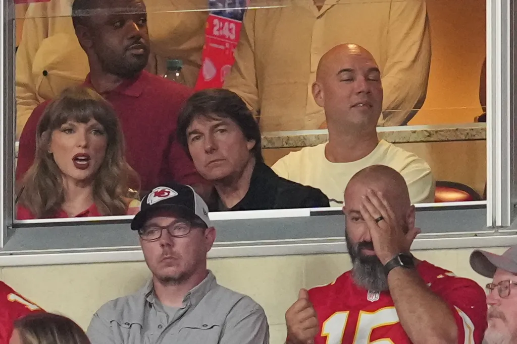 Taylor Swift and Tom Cruise watching the Chiefs game from a suite.