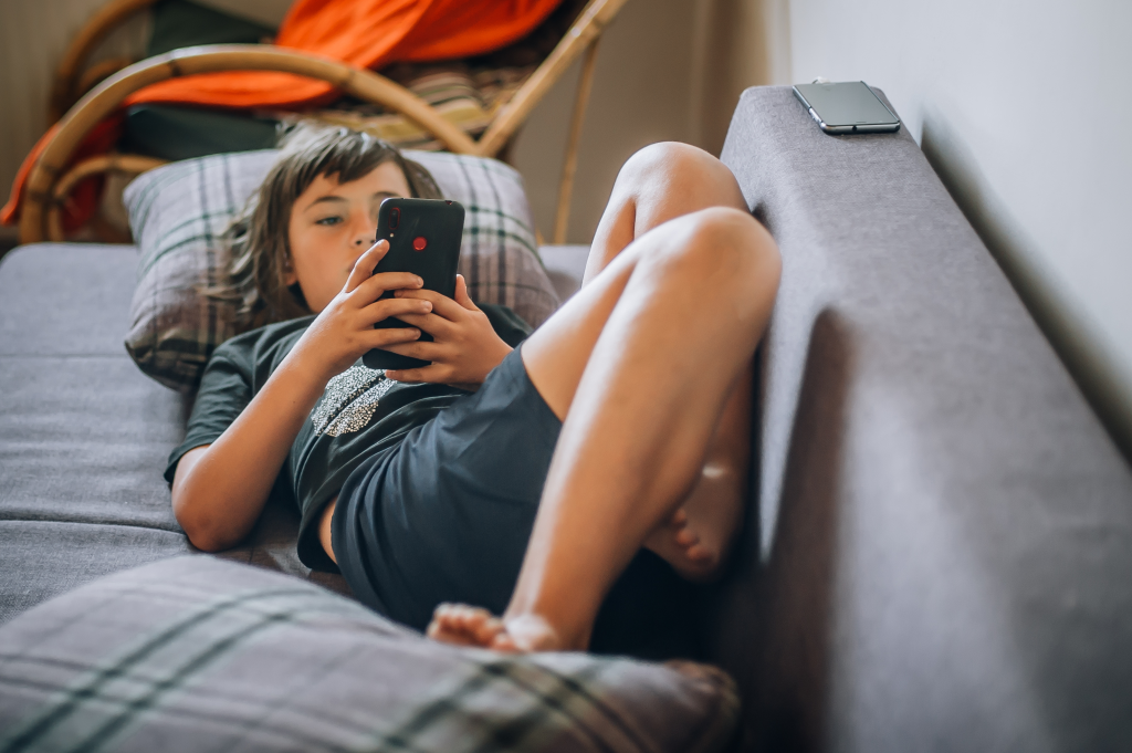 teen on smartphone
