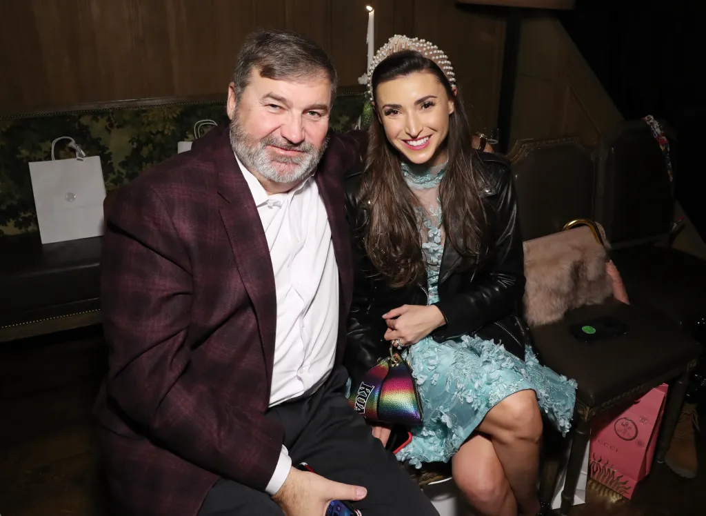 Todd Bradley and Bronwyn Newport smiling at a Margit David fashion show.