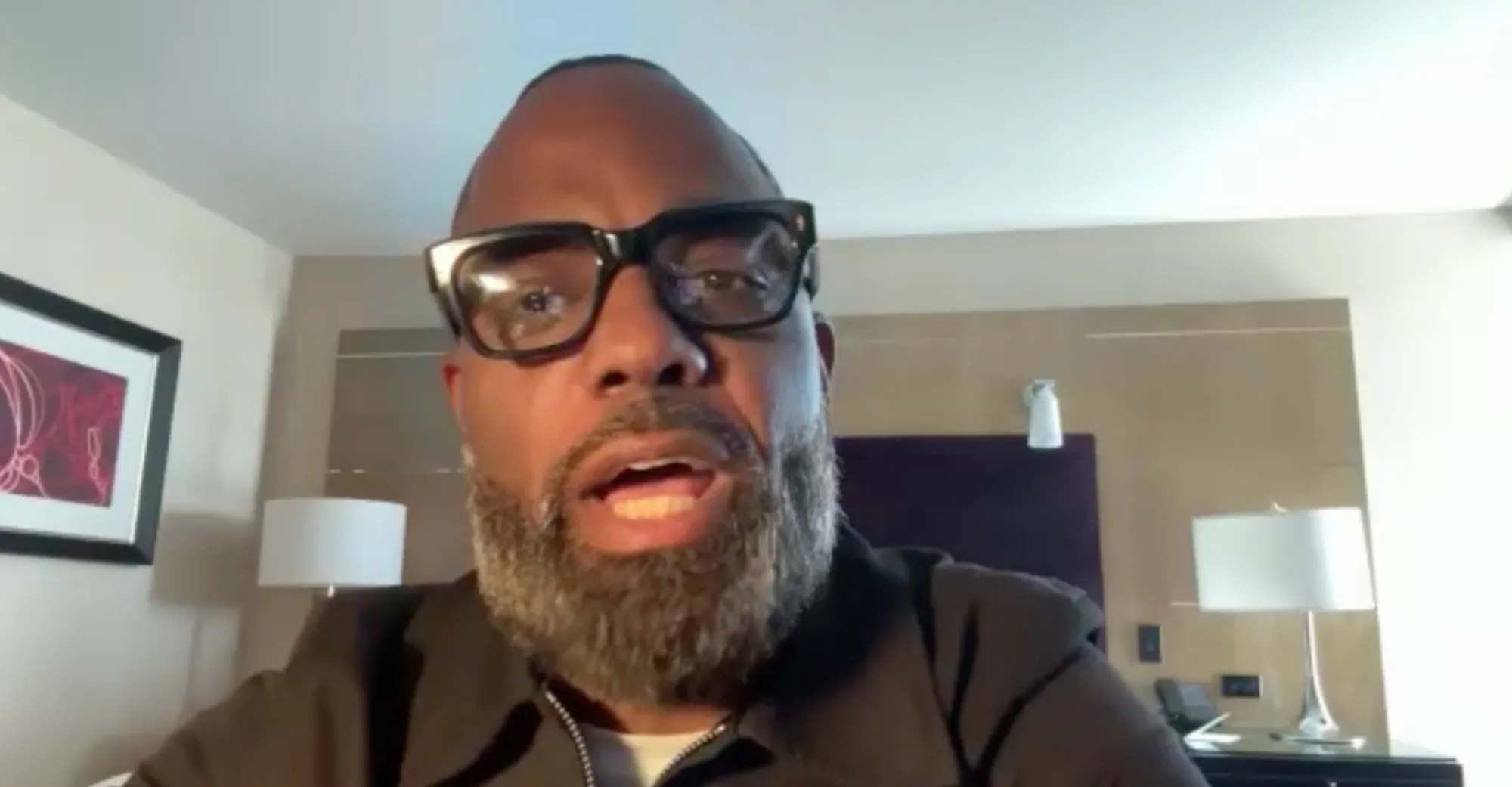 Todd Tucker speaking during a video call.