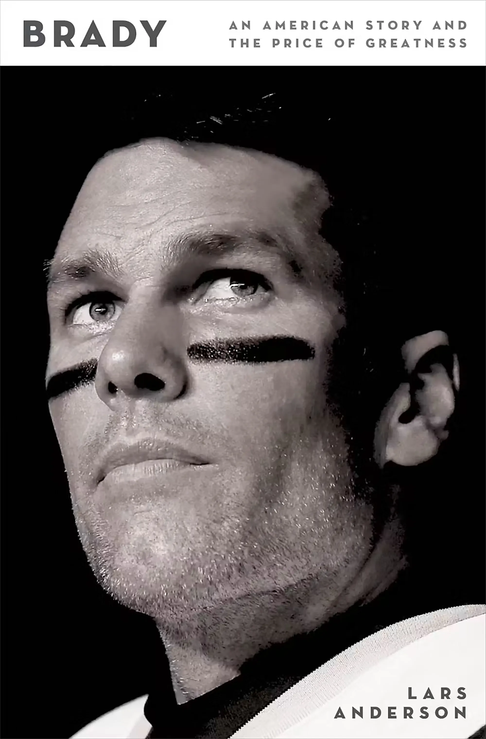 Book cover for Brady: An American Story and the Price of Greatness by Lars Anderson, featuring a black-and-white portrait of Tom Brady with eye black.