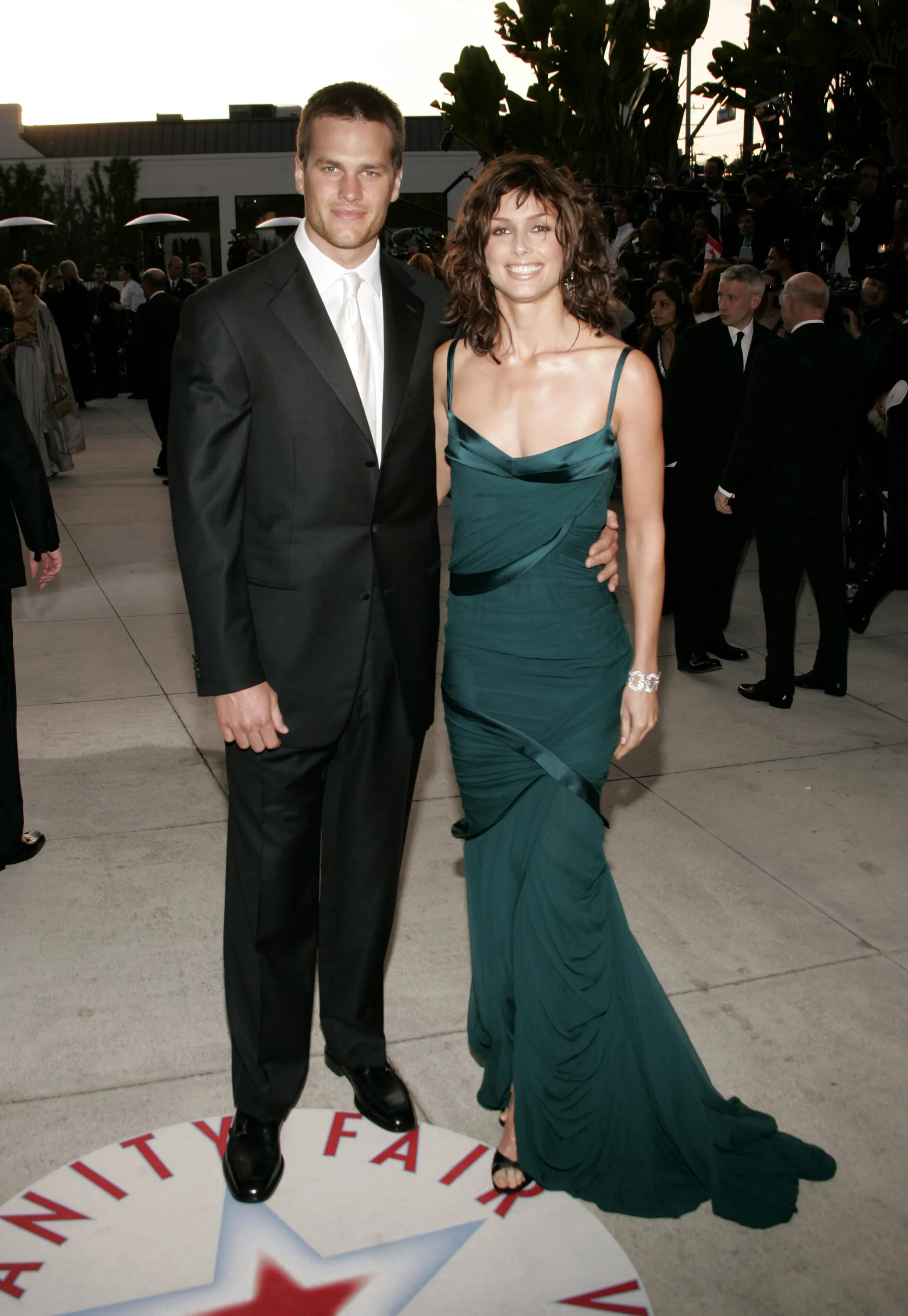 Tom Brady and Bridget Moynahan pose together at an Oscar party.