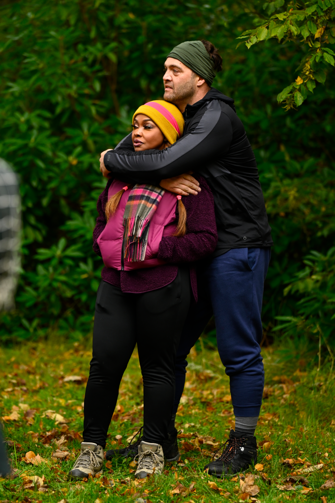 Phaedra Parks and Chris Tamburello hugging outdoors.