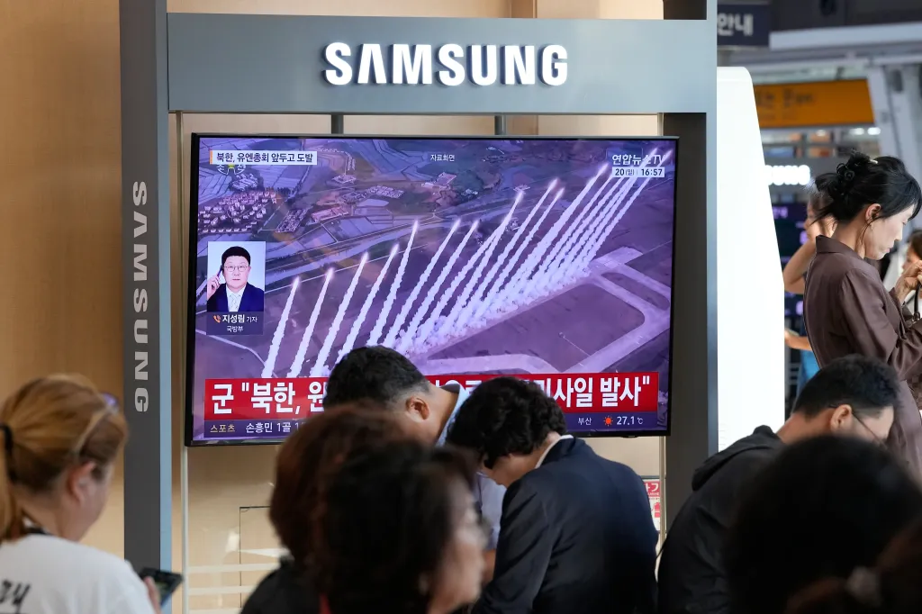 A TV screen shows a file image of a North Korean missile launch during a news program at Seoul Railway Station in Seoul, South Korea on Sept. 20, 2026.