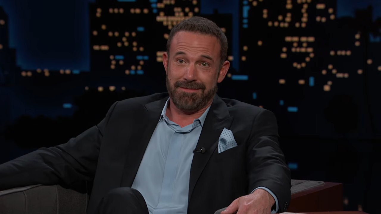 Ben Affleck on a late-night talk show set.