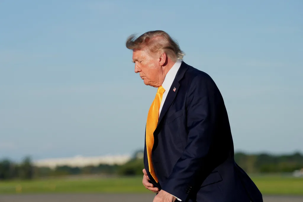 U.S. President Donald Trump walks after exiting Air Force One in Morristown, New Jersey.
