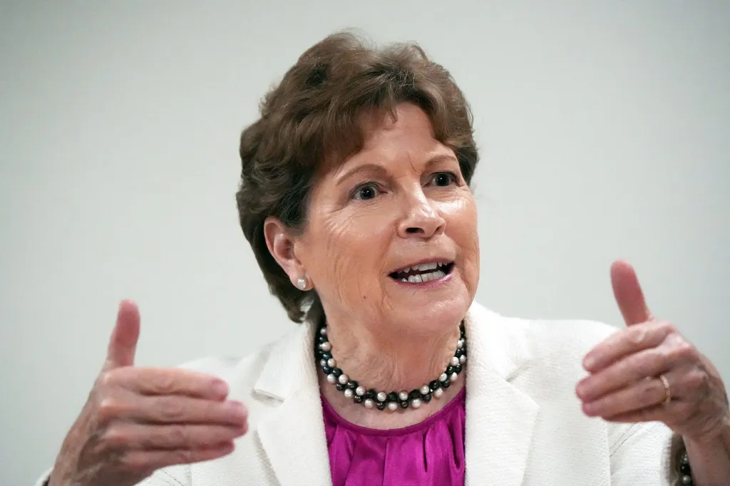 U.S. Sen. Jeanne Shaheen speaking during an interview, gesturing with both hands.