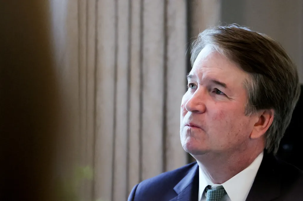 U.S. Supreme Court Justice Brett Kavanaugh listens to remarks.