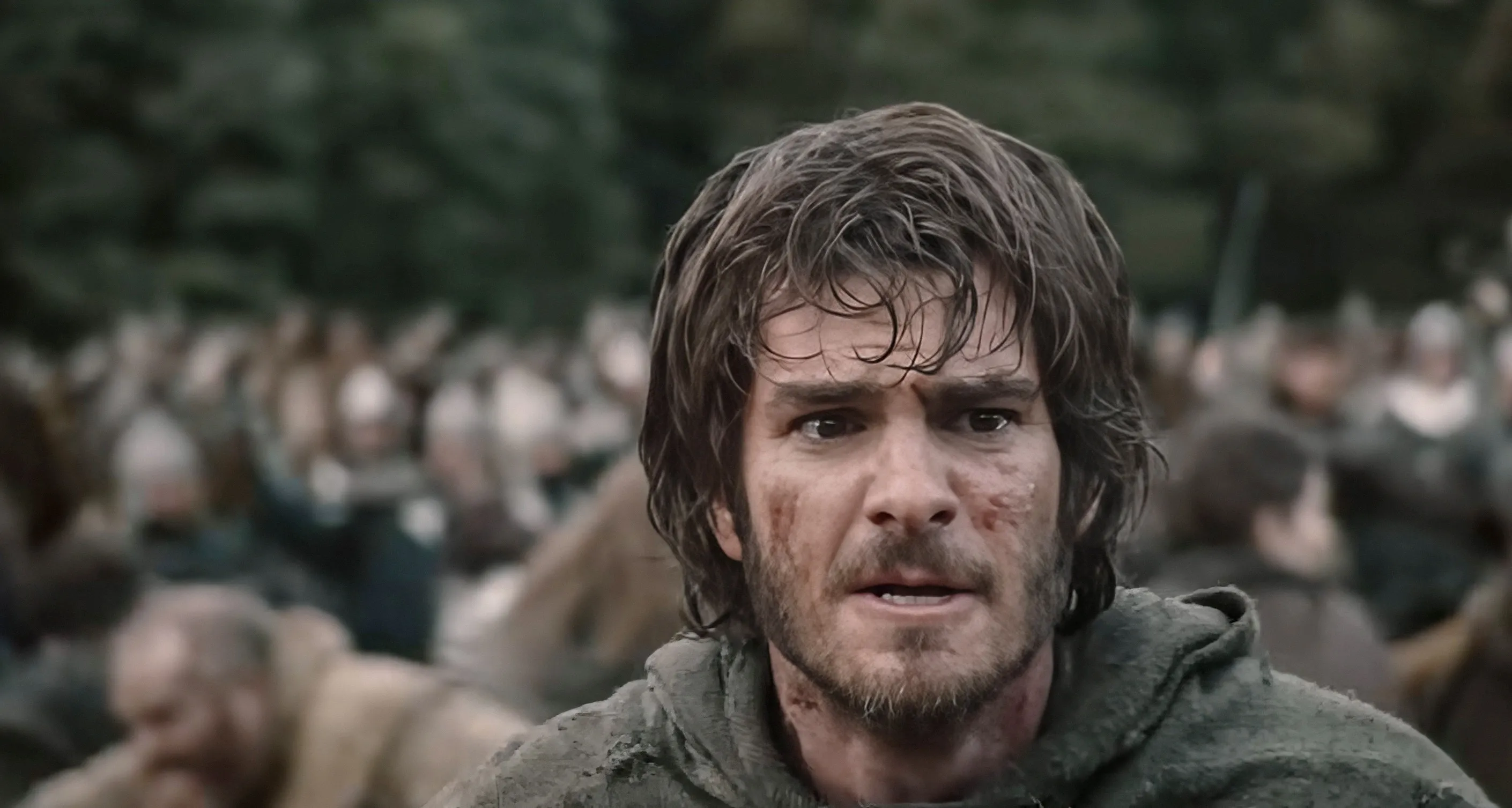 Andrew Garfield as a blood-splattered warrior in 