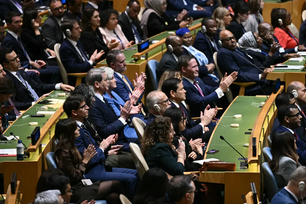 The U.S. delegation applauds during the 81st United Nations General Assembly.