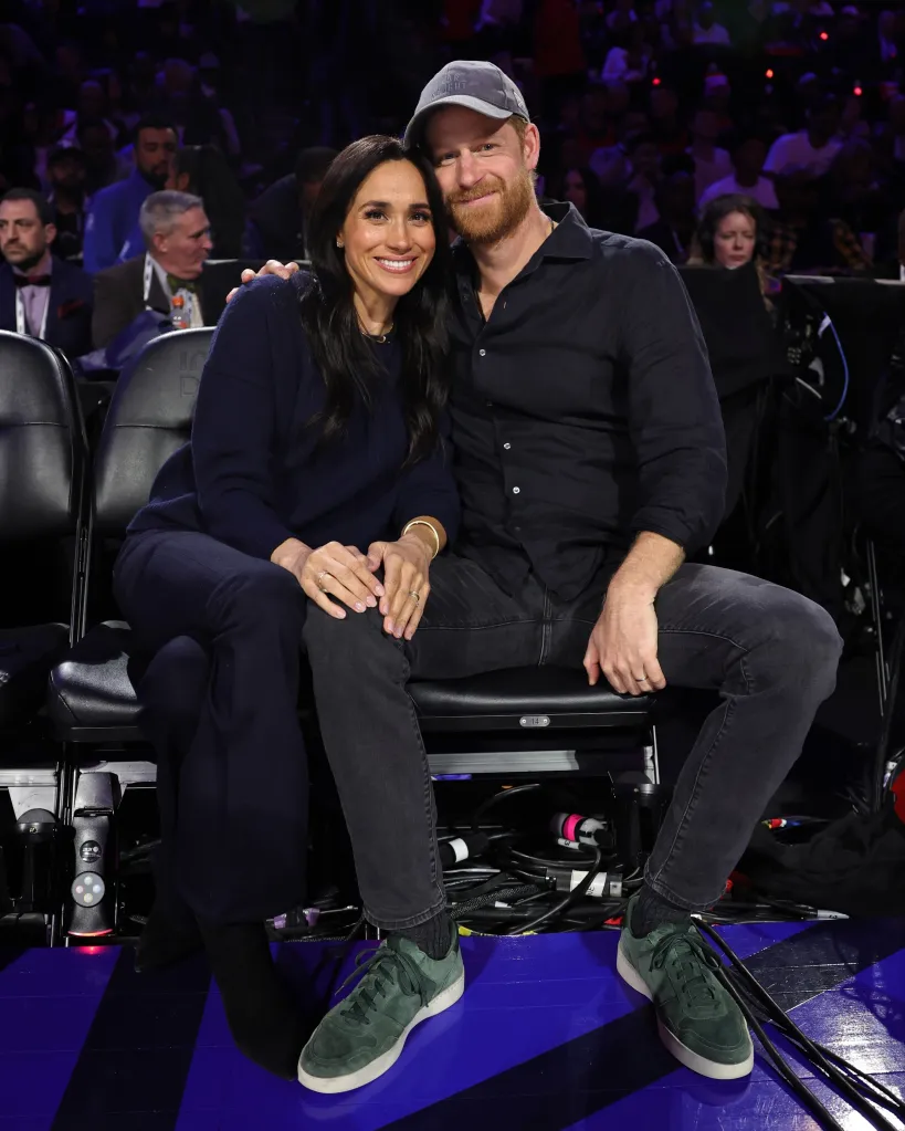 Meghan Markle and Prince Harry posing for a picture during the 75th NBA All-Star Game.
