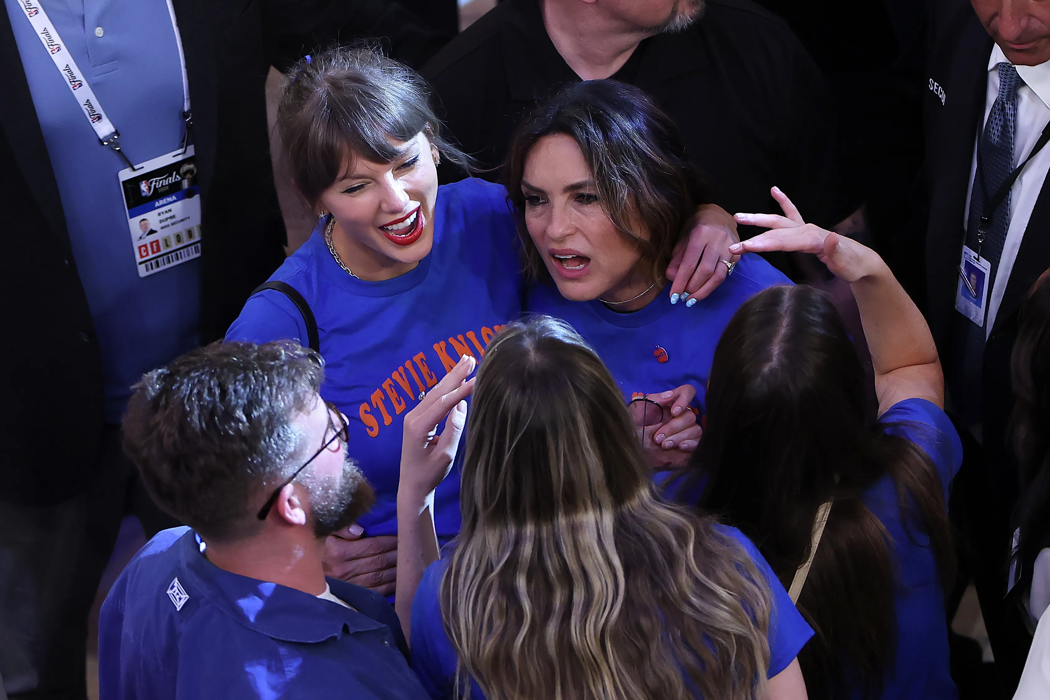 Taylor Swift and Mariska Hargitay celebrating during an NBA Finals game.