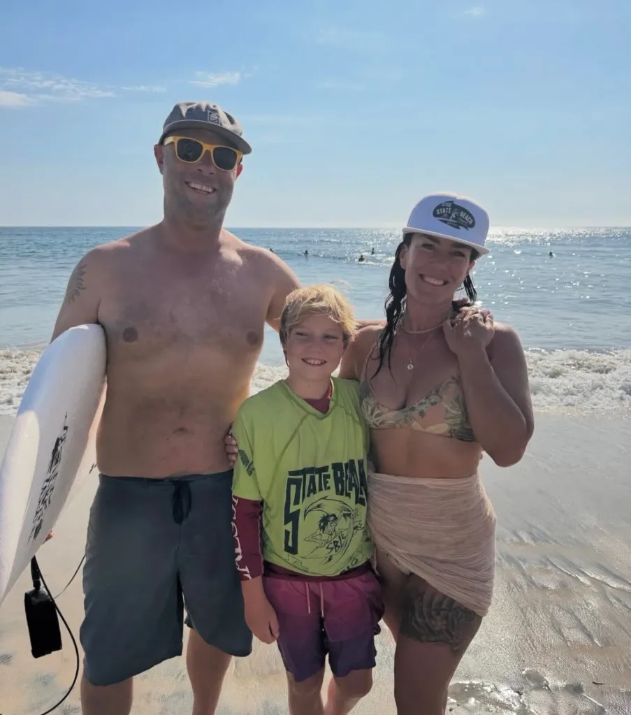 Vanessa Michelson Wheyland with her husband and child at the beach.