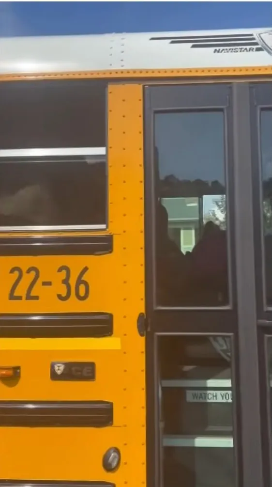 Three Georgia parents face charges after an investigation cleared a school bus driver accused of locking children inside without air conditioning.