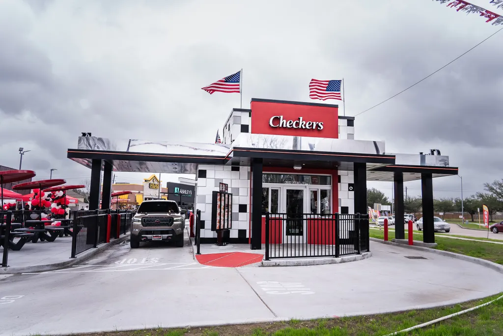 A view of the drive-through line at the Grand Opening Pre-Super Bowl Party at Baytown Checkers.
