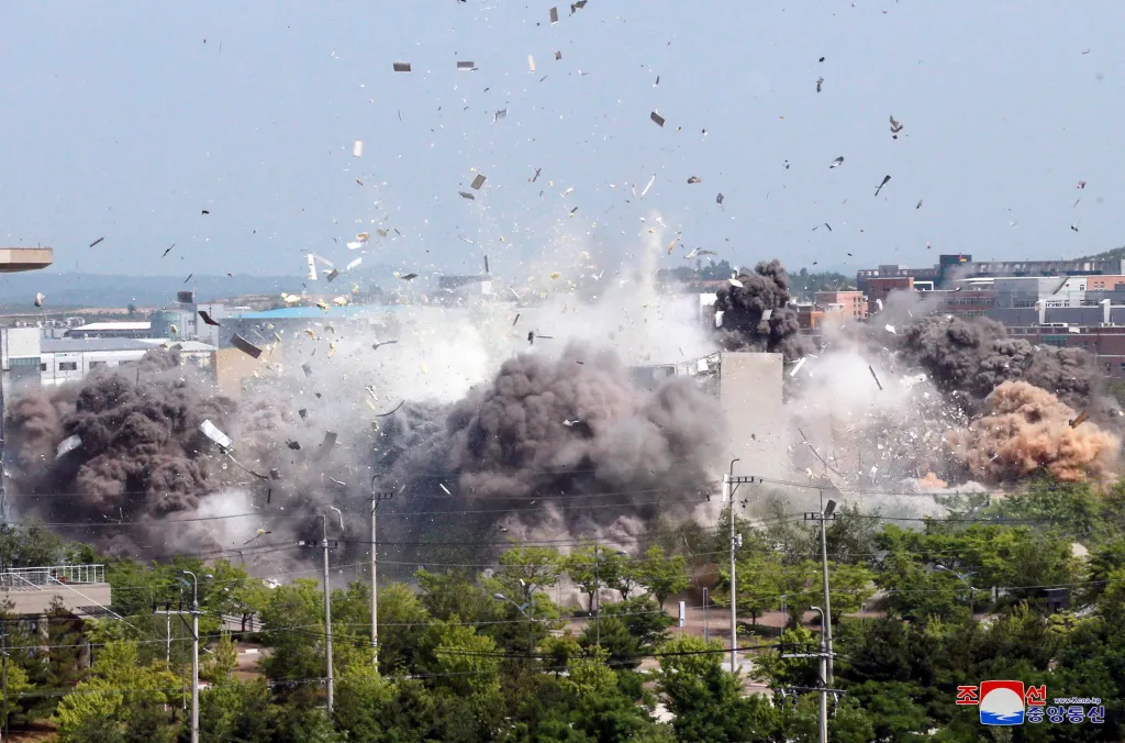 An explosion is seen at a joint liaison office with South Korea in the border town of Kaesong, North Korea, on June 16, 2020.