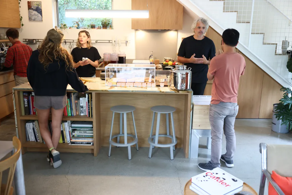 Visitors gather at GRANADA, a private residence that opens to the public as a community space.