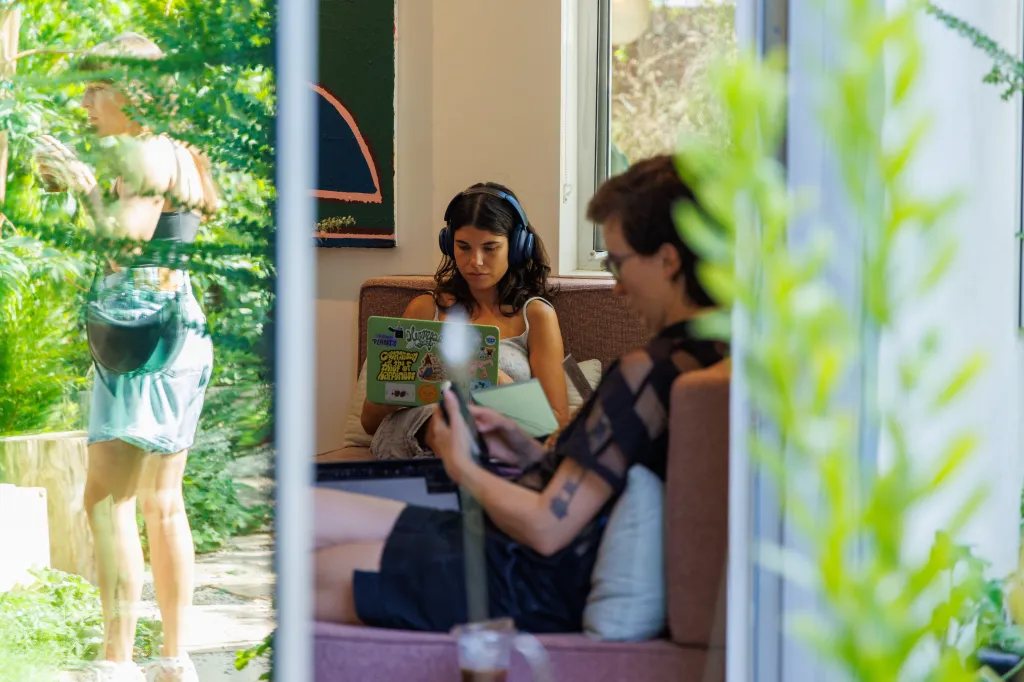 Visitors gathering at GRANADA, a private residence that operates as a community space.
