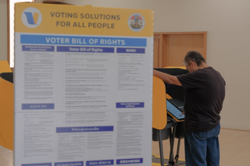 A voter casts a ballot at a polling place in Los Angeles.