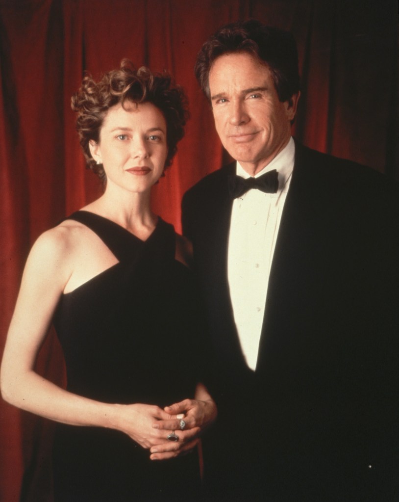 Warren Beatty and Annette Bening posing in formal attire.