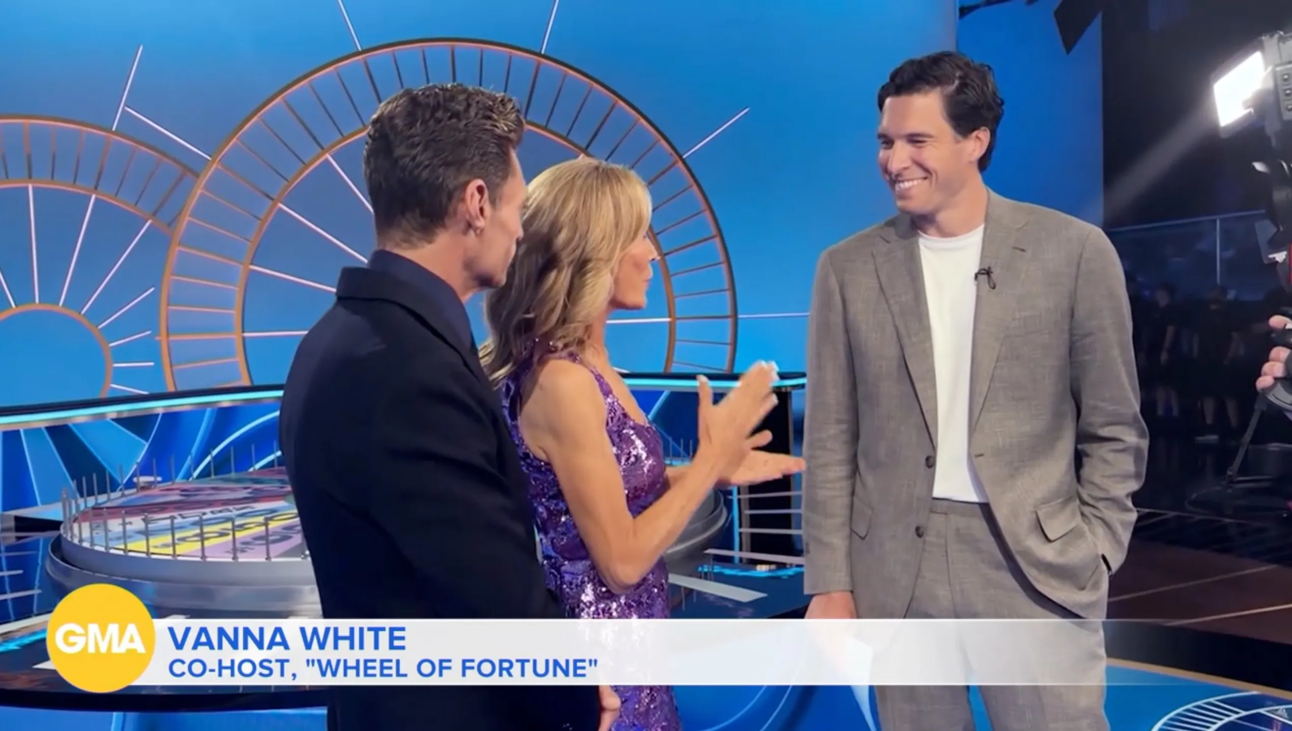 Vanna White of Wheel of Fortune being interviewed for a segment about a new game,