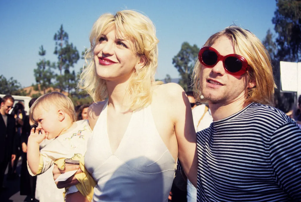 Kurt Cobain of Nirvana with wife Courtney Love and daughter Frances Bean Cobain.
