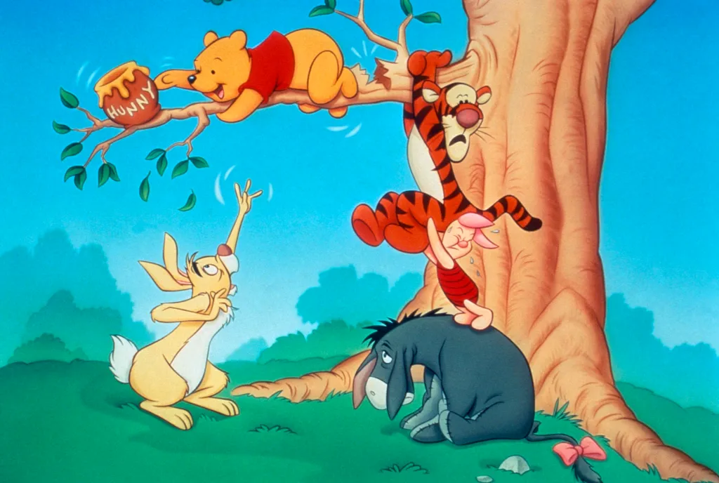 Illustration of Winnie the Pooh reaching for honey in a tree, with Tigger, Piglet, Rabbit, and Eeyore below.