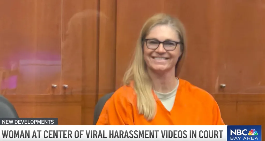 Lindsay Hansen smiling during her court appearance at the Hall of Justice.