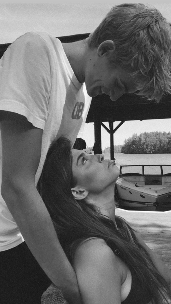 Charlotte D'Alessio looking up at Presley Gerber.