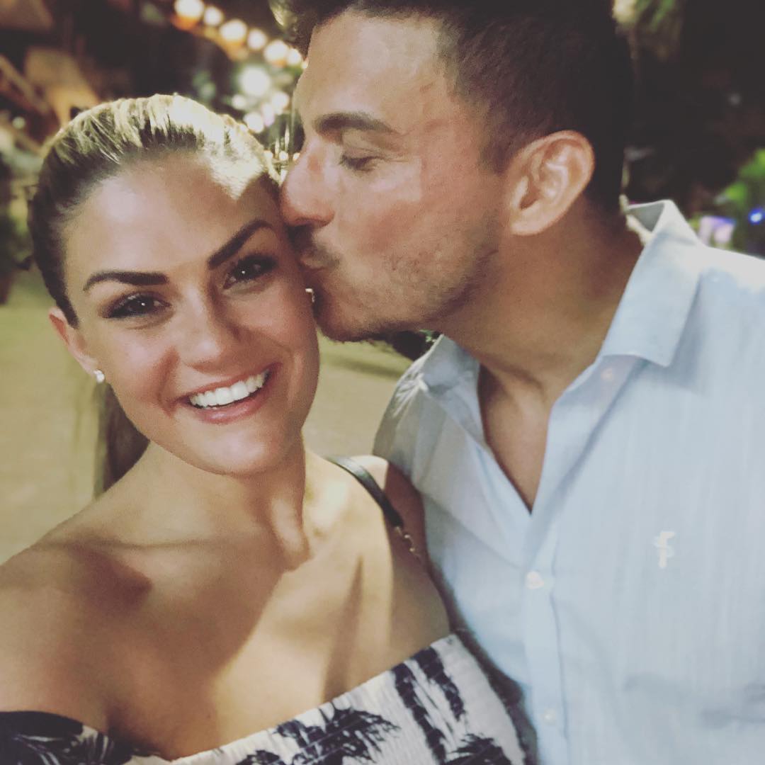 Jax Taylor kissing Brittany Cartwright on the cheek.