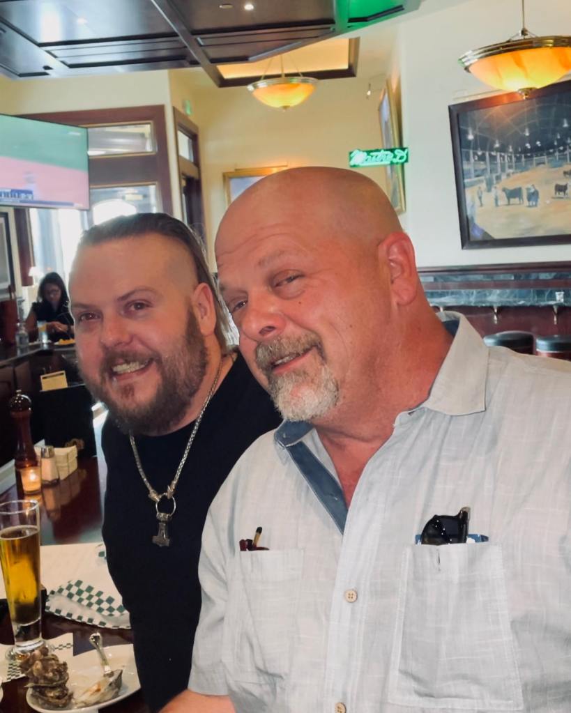 Rick Harrison and his son Adam at a restaurant.