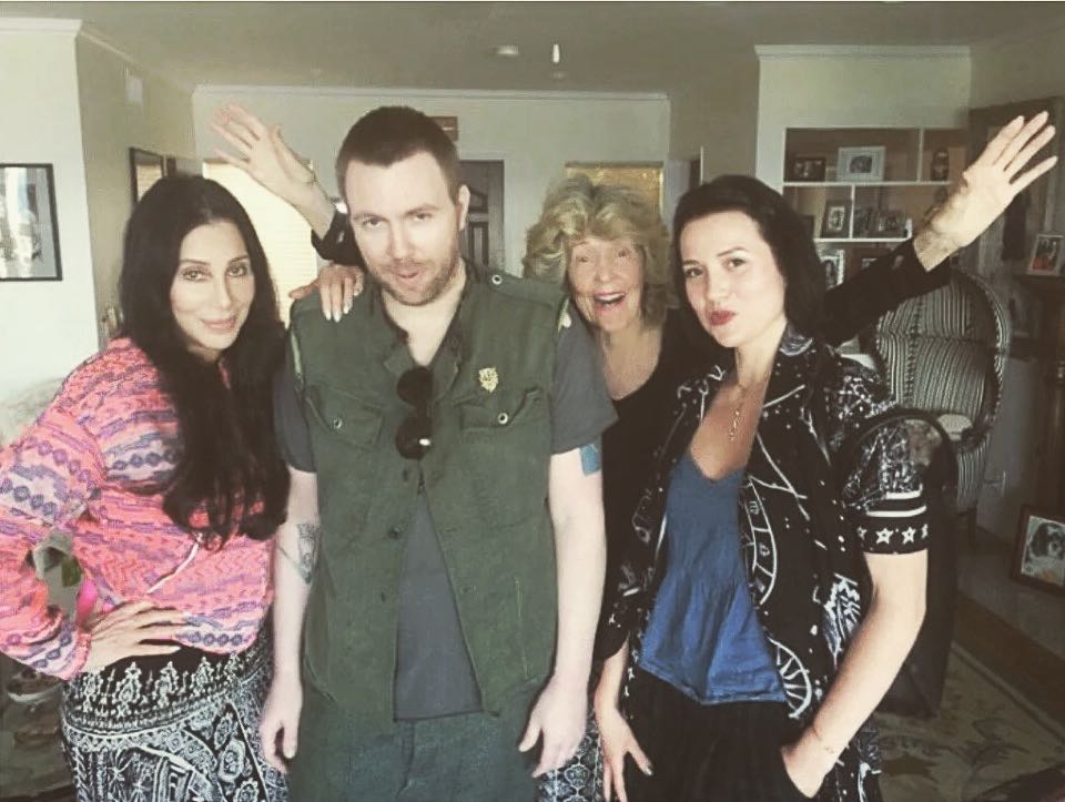 Cher, Elijah Blue Allman, and Marieangela King posing with another woman.