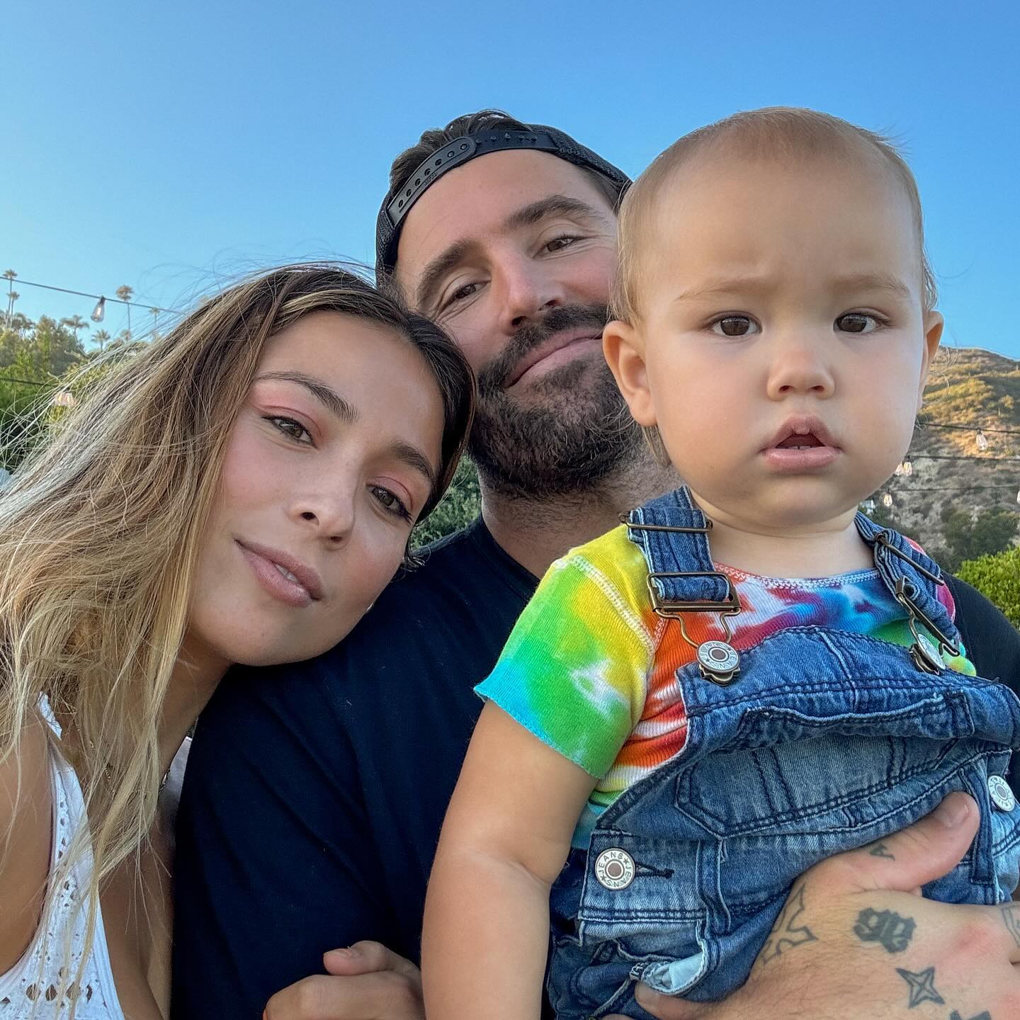 Brody Jenner, Tia Blanco, and their daughter together.