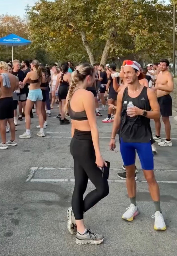 A run club gathers in Venice Beach, California.