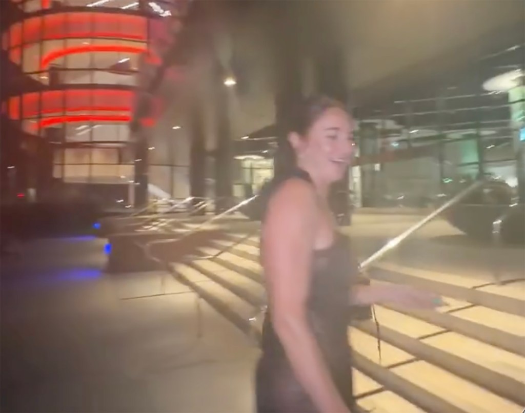 Shailene Woodley laughing outside at night